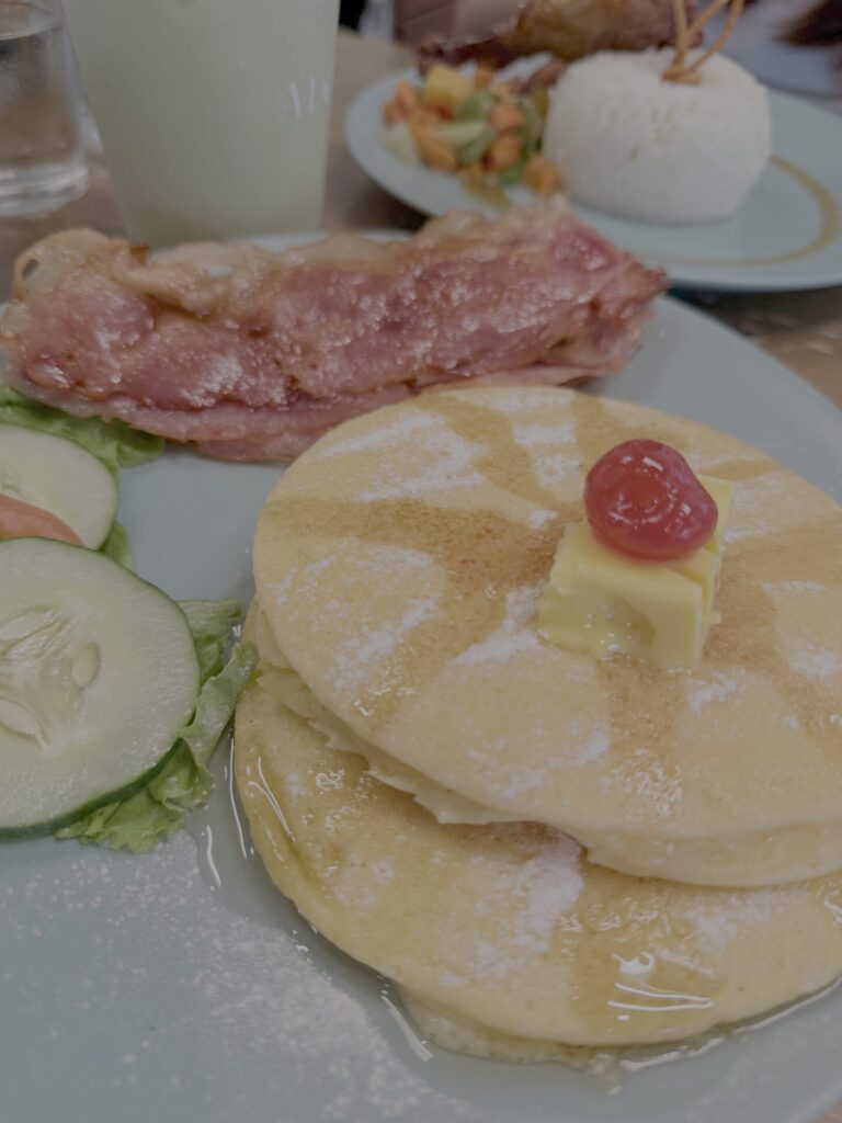 Eating pancakes while working